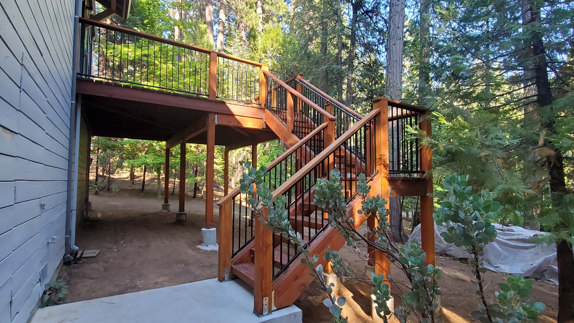 Side view of the stairs leading to a deck built by BTN Construction in Arnold, CA